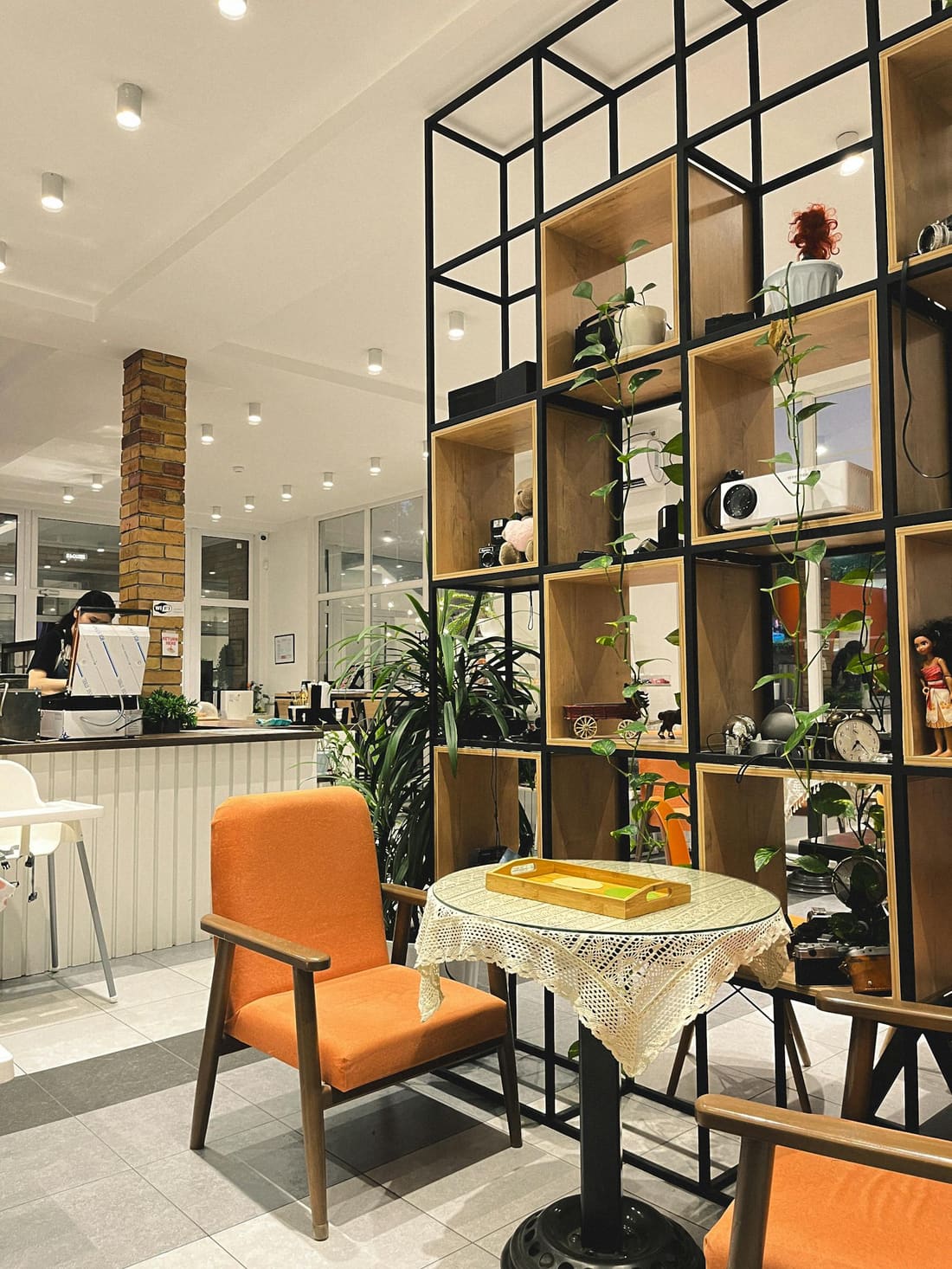 The warm, plant-filled interior of The Upside on Prospect